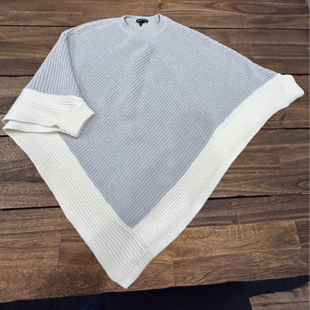 Club Monaco woman’s cape sweater. 100% wool. Size small. Cream/gray. New conditi